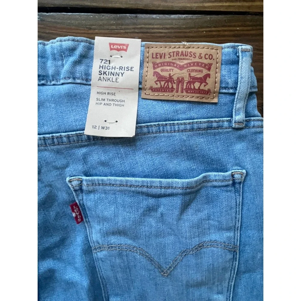 Levis 721 High Rise Skinny Ankle Jeans Light Wash Distressed Blue Size 31 NEW‎